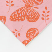Orangefarbenes Schmetterlingsmuster im rosa Hinter Fleecedecke (Ecke)
