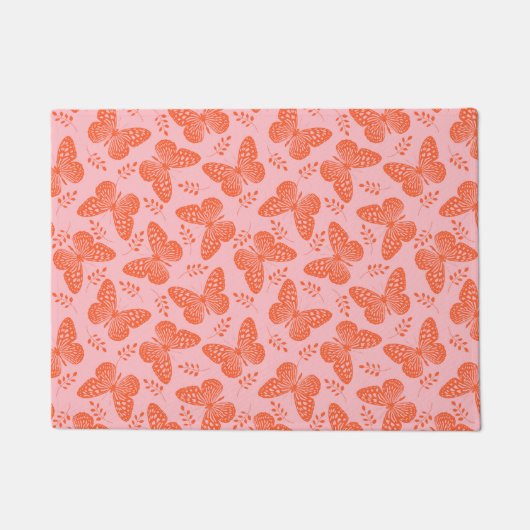 Orangefarbenes Schmetterlingsmuster im rosa Hinter Fußmatte (Vorderseite)