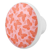 Orangefarbenes Schmetterlingsmuster im rosa Hinter Keramikknauf (Rechts)