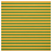 Orangefarbenes und dunkelgrünes Muster Stoff (Muster)