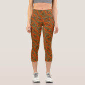 Orangefarbenes und grünes Grasdesign Capri Leggings (Vorderseite)