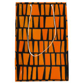 Orangefarbenes und schwarzes afrikanisches Stammes Mittlere Geschenktüte (Vorderseite)