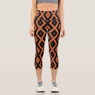 Orangefarbenes und schwarzes Diamantmuster Capri Leggings