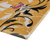 Orangefarbenes und schwarzes grafisches Design, la Schneidebrett (Ecke)