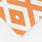 Orangefarbenes und weißes Diamantmuster Fleecedecke (Ecke)