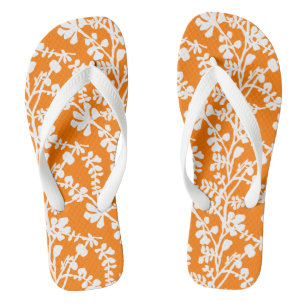 Orangefarbenes und weißes, florales Wiederholmuste Badesandalen
