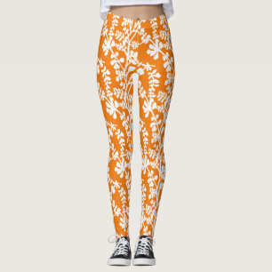 Orangefarbenes und weißes, florales Wiederholmuste Leggings