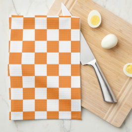 Orangefarbenes und weißes kariertes Küchentuch