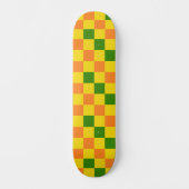 Orangegelbe grün karierte Musterdesign Skateboard (Vorderseite)