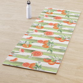 Orangen auf grünen und weißen Streifen Yogamatte