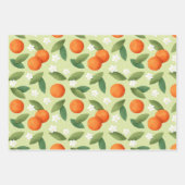 Orangen, grüne Blätter und Muster der weißen Blume (Vorderseite)