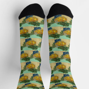 Orangen und Zitronen mit blauen Handschuhen von Va Socken