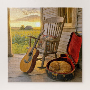 Orangene Katze schläft in einem Gitarrenkoffer Puzzle
