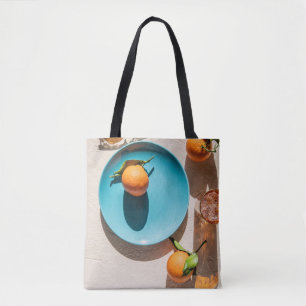 Orangenfrüchte auf Platte Tasche