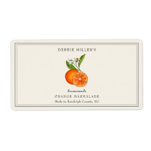 Orangenmarmelade-Glas auf rechteckigem Cremeweiß