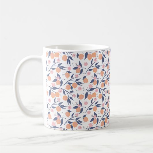 Orangenzitrus und blaue Blätter Tasse (Links)
