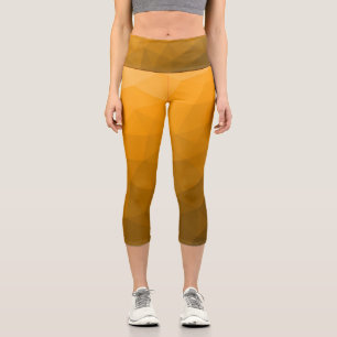 Oranger geometrischer Maschenverlauf mit Farbverla Capri Leggings