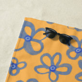 Oranges und blaues florales Strandtuch (Beispiel)