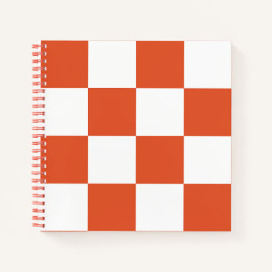 Oranges und weißes Schachbrettmuster Notizblock