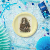 Orangutan-Baby mit Blätter Pappteller (Party)