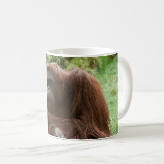 Orangutan essen kaffeetasse (VorderseiteRechts)