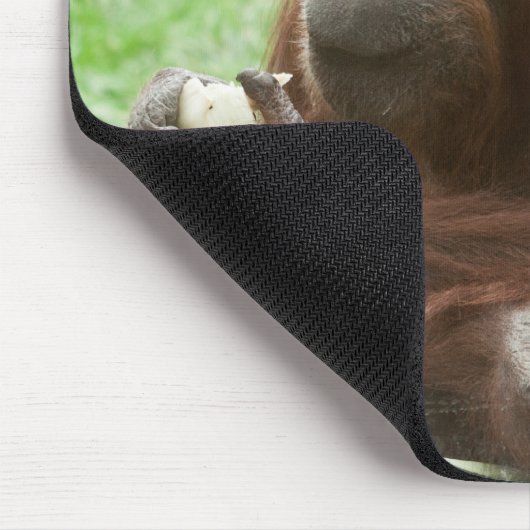 Orangutan essen mousepad (Ecke)