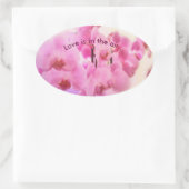 Orchideen. Text. Ovaler Aufkleber (Tasche)