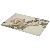 Orientalischer Vogel gehockt auf Niederlassung Schneidebrett (Ecke)