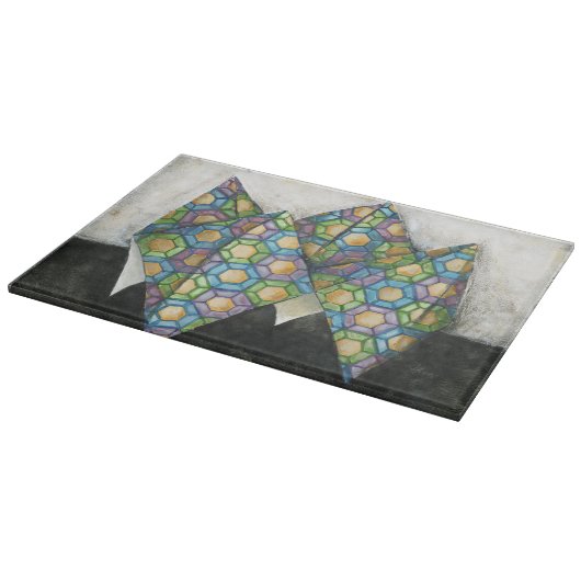 Origami Fortune Teller auf geometrischem Papier Schneidebrett (Ecke)