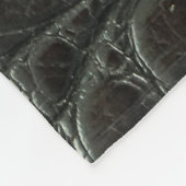 Originelle schwarze Alligatorledertextur, nah Fleecedecke (Ecke)