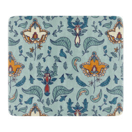 Ornate floral pattern on a pale blue background schneidebrett