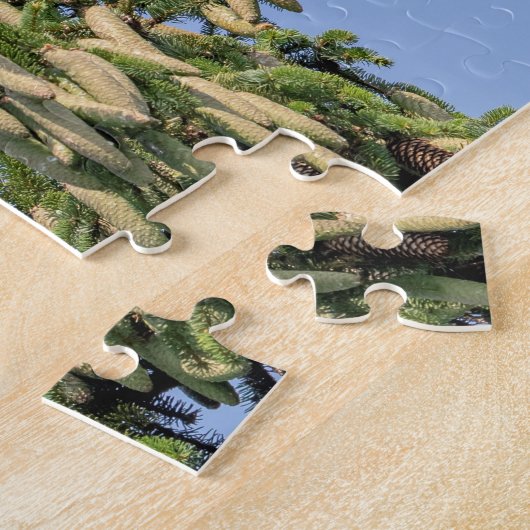 Ospreu, der von einem Kiefernbaum abhebt Puzzle (Seite)