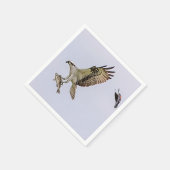 Osprey, der durch eine rotgeflügelte Amsel gejagt Serviette (Ecke)