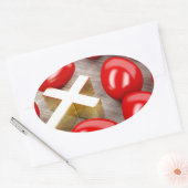 Osterdekoration mit Eiern und Kreuz Ovaler Aufkleber (Umschlag)