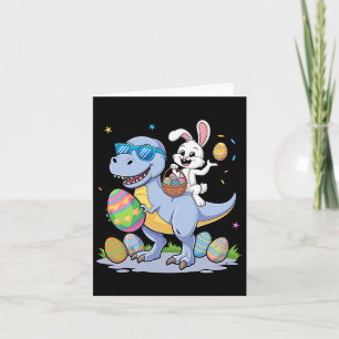 Osterdinosaurier T-rex und sonniges Holding Farbe  Karte