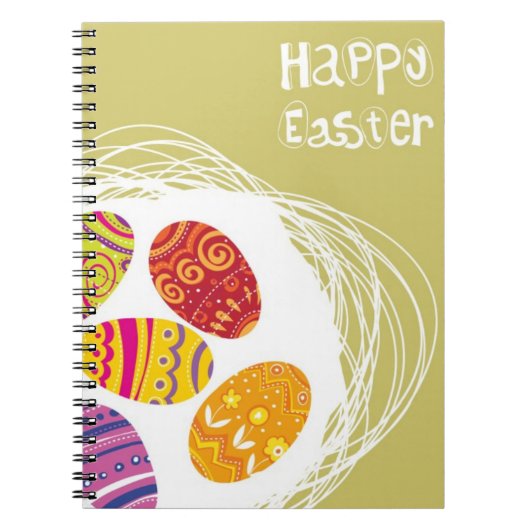 Osterei im Nest auf grünem Hintergrund Notizblock (Vorderseite)