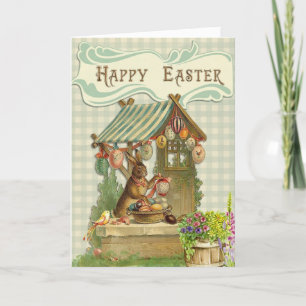Osterhase malt Ostereier Frohe Ostern Feiertagskarte