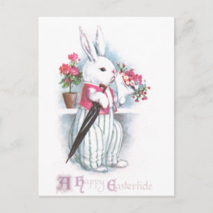 Osterhase mit Blumenstrauß aus rosa Blüten Feiertagspostkarte