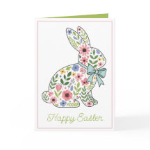 Osterhase mit rosa und blauen Wildblumen