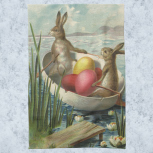 Osterhasen im Vintage-Stil in einem Boot mit Oster Geschirrtuch