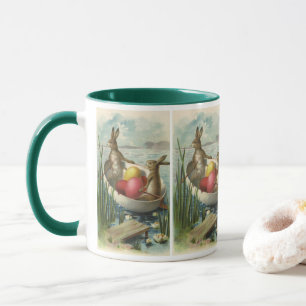 Osterhasen im Vintage-Stil in einem Boot mit Oster Tasse