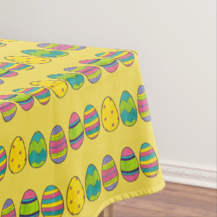 Osterkörbe Eizelljagd farbenfrohe Eier Tischdecke