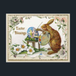 Ostersegmente Künstler Bunny Vintag Reproduction Feiertagspostkarte<br><div class="desc">Adorable Vintage Stil Ostersegmente Postkarte mit einem sonnigen Kaninchen bemalt ein Ostereier,  umgeben von einer Blumengrenze. Die Worte "Ostersegmente" haben ein Imitat Glitzer Aussehen,  sowie Teile des Rahmens. HINWEIS: Glitzer wird digital erstellt. Entworfen von einfach Vintag von Robin unter Verwendung von Elementen aus dem Old Design Shop.</div>