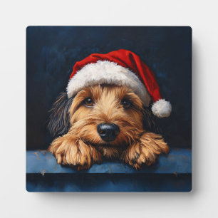 Otterhound in einer Weihnachtsmannmütze Fotoplatte