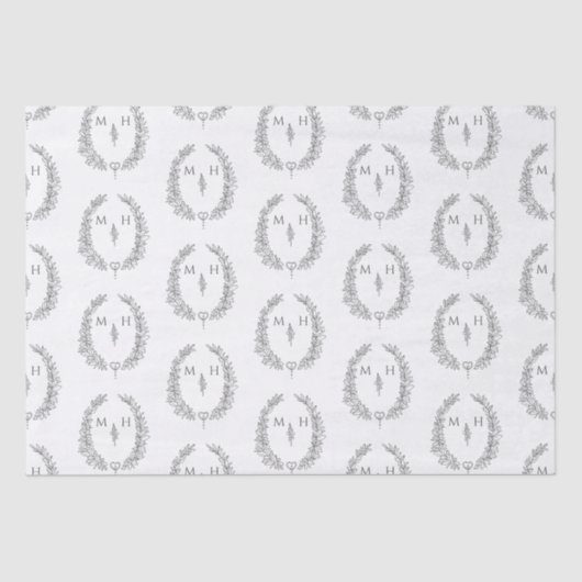 Ovales Leaf-Monogramm, grau zeichnend auf der weiß Seidenpapier (Vorderseite)