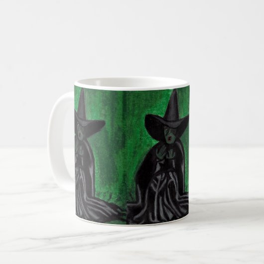 OZ MELTING WITCH    KAFFEETASSE (Vorderseite Links)