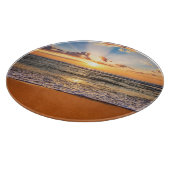 Ozeansonnenaufgang, tiefblauer Horizont. Schneidebrett (Ecke)