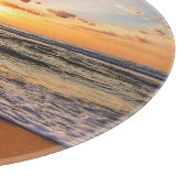 Ozeansonnenaufgang, tiefblauer Horizont. Schneidebrett (Ecke)