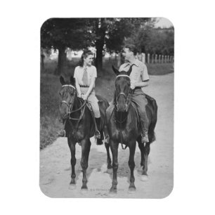 Paar beim Reiten auf Pferden Magnet