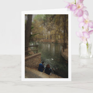 Paar füttert Enten im San Vicente Park Karte